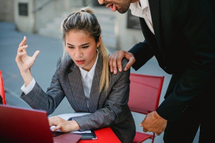 girl looking confused at a computer not sure where t start