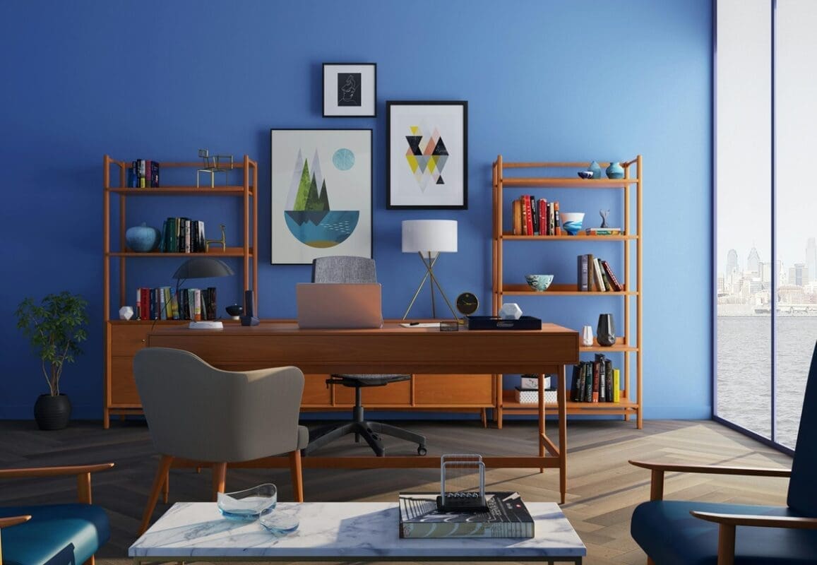 Modern Freelance Web Designer office with desk in blue